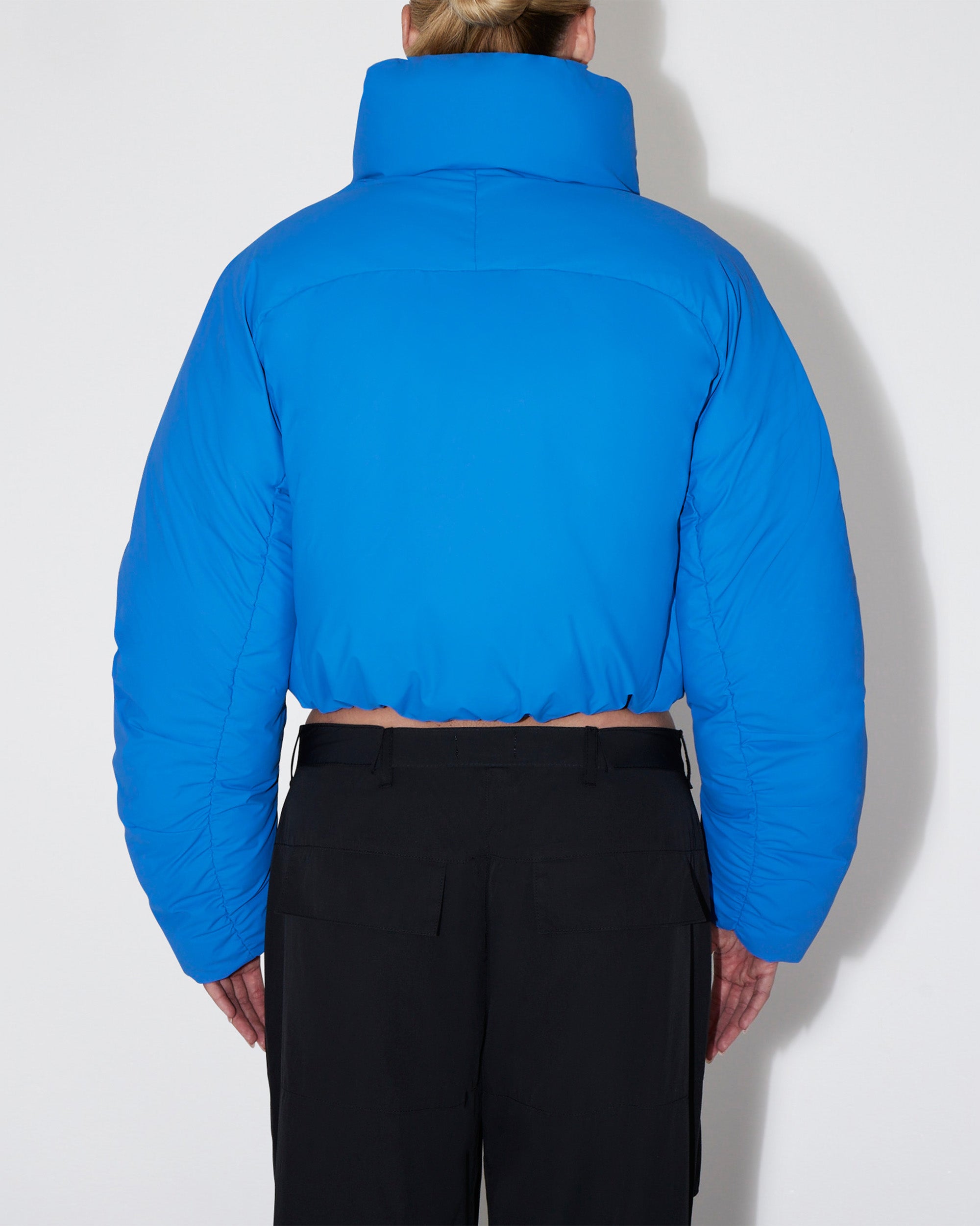 cropped blue puffer jacket